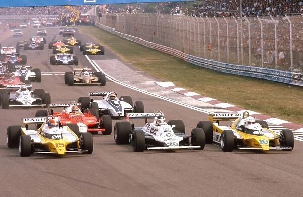 1980 Italian Grand Prix: Rene Arnoux and Jean-Pierre Jabouille lead away at the start with Carlos Reutemann sandwiched in between