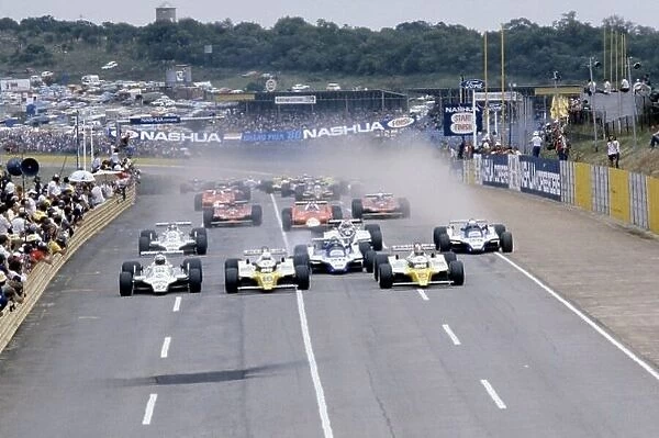 1980 South African Grand Prix. Kyalami, South Africa. 28 February-1 March 1980. Alan Jones (#27 Williams FW07B-Ford Cosworth), Rene Arnoux (#16 Renault RE20) and Jean-Pierre Jabouille (#15 Renault RE20) lead at the start. World Copyright