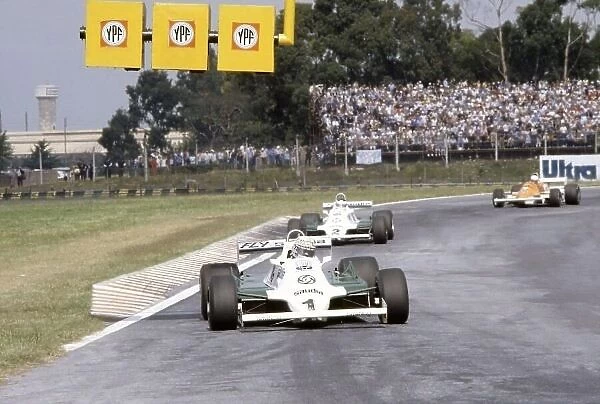 1981 Argentinian Grand Prix. Buenos Aires, Argentina. 10-12 April 1981. Alan Jones leads Carlos Reutemann (both Williams FW07C-Ford Cosworth) and Riccardo Patrese (Arrows A3-Ford Cosworth). World Copyright: LAT Photographic Ref