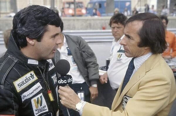 1981 Monaco Grand Prix. Monte Carlo, Monaco. 28-31 May 1981. Jackie Stewart interviews Alan Jones (Williams FW07C-Ford Cosworth) for ABC Television. Portrait. World Copyright: LAT Photographic Ref: 35mm transparency 81MON54