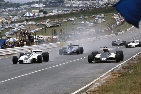 1981 South African Grand Prix.: Nelson Piquet, 2nd position, leads Derek Daly, 11th position and Desire