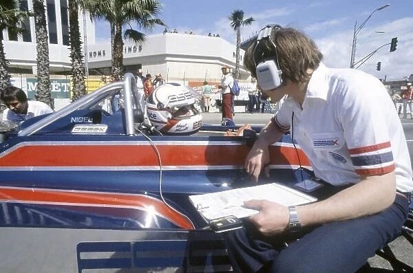 1981 United States Grand Prix West. Long Beach, California, USA. 13-15 March 1981. Nigel Mansell (Lotus 81B-Ford Cosworth) in the pits. World Copyright: LAT Photographic Ref: 35mm transparency 81LB28