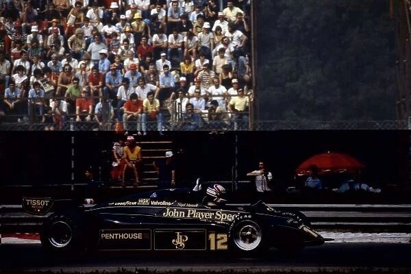 1982 Italian Grand Prix. Monza, Italy. 12 September 1982. Nigel Mansell, Lotus 91-Ford, 7th position, action. World Copyright: LAT Photographic Ref: 35mm transparency 82ITA
