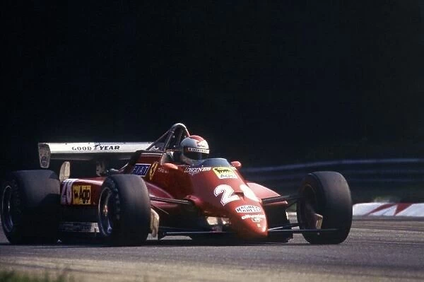 1982 Italian Grand Prix. Monza, Italy. 12 September 1982. Mario Andretti, Ferrari 126C2, 3rd position, action. World Copyright: LAT Photographic Ref: 35mm transparency 82ITA