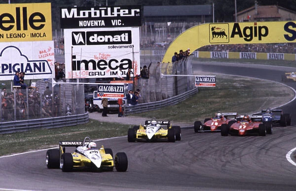 1982 SAN MARINO GP. Rene Arnoux leads away the field at the start of the race at Imola