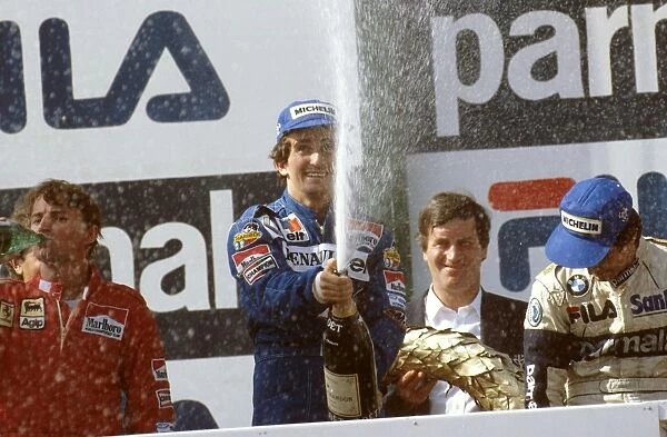 1983 Austrian Grand Prix: Alain Prost 1st position, Rene Arnoux 2nd position and Nelson Piquet 3rd position on the podium