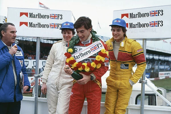 1983 British Formula 3 Championship. Silverstone, England. 6th March 1983. Ayrton Senna (Ralt RT3-Toyota), 1st position, with Martin Brundle (Ralt RT3-Toyota), 2nd position and Davy Jones (Ralt RT3-VW), 3rd position, on the podium, portrait