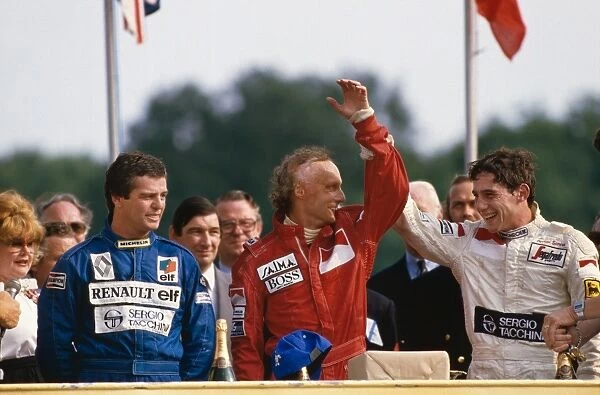 1984 British Grand Prix: Niki Lauda 1st position, Derek Warwick, 2nd position and Ayrton Senna, 3rd position, on the podium, portrait