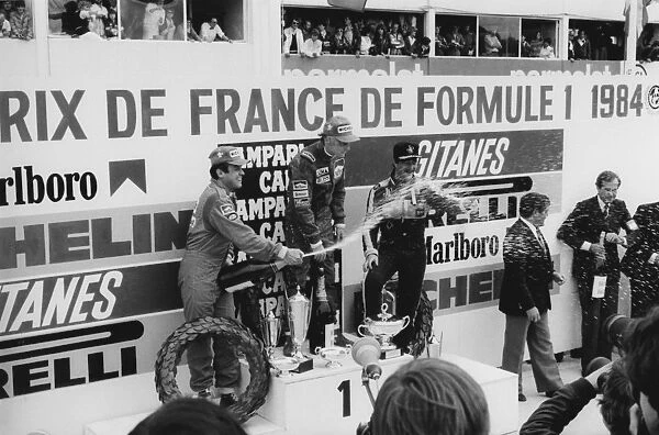 1984 French Grand Prix: Dijon-Prenois, France. 18th - 20th May 1984. Niki Lauda, 1st position with Patrick Tambay 2nd position and Nigel Mansell