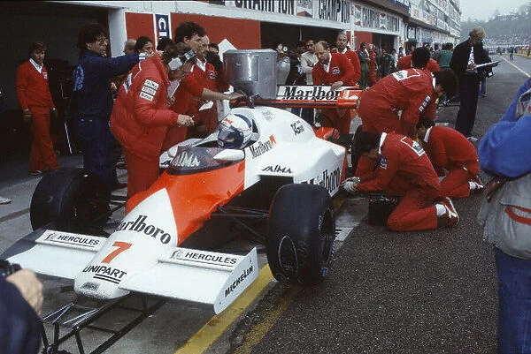 1984 San Marino Grand Prix. Imola, Italy. 4th - 6th May 1984. Alain Prost (McLaren MP4 / 2-TAG Porsche), 1st position, pit stop, action. World Copyright: LAT Photographic. Ref: 84 SM b