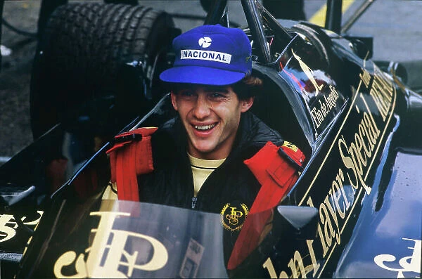 1985 Dutch Grand Prix. Zandvoort, Holland. 23rd - 25th August 1985. Ayrton Senna (Lotus 97T-Renault), sits in team mates Elio de Angelis car in the pits, portrait. World Copyright: LAT Photographic. Ref: 85HOLa