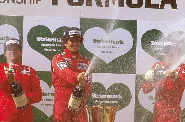 1986 Austrian Grand Prix: Alain Prost 1st position, Michele Alboreto, 2nd position and Stefan Johansson, 3rd position on the podium