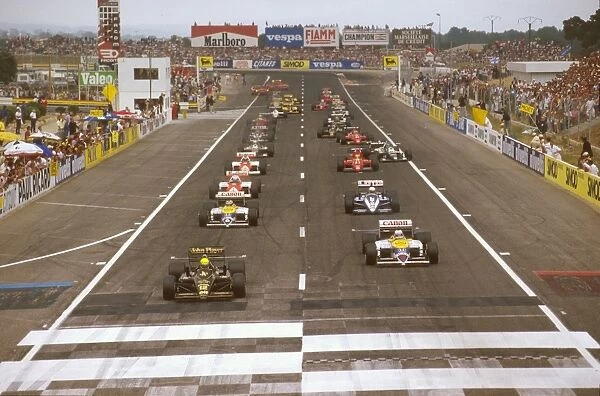 1986 French Grand Prix: Ayrton Senna leads Nigel Mansell, Nelson Piquet, Rene Arnoux and Alain Prost at the start
