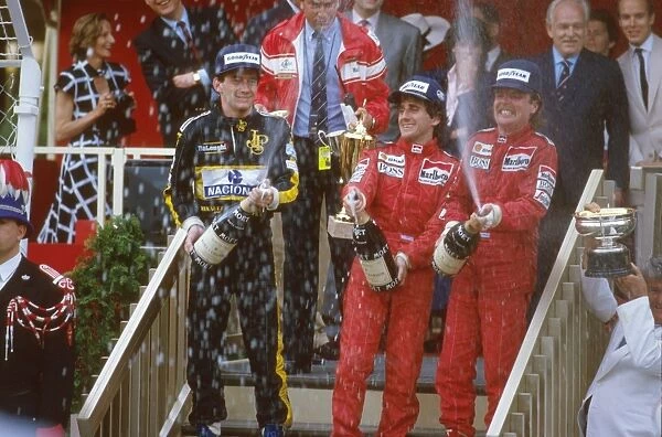 1986 Monaco Grand Prix: Alain Prost, 1st position, Keke Rosberg, 2nd position and Ayrton Senna 3rd position on the podium