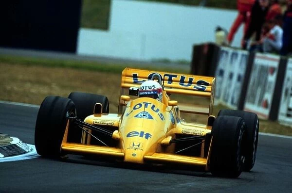 1987 BRITISH GP. Saturo Nakajima finishes 4th behind his Lotus team mate Ayrton Senna