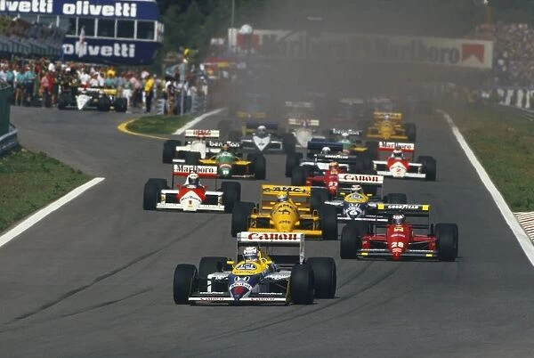 1987 Portuguese Grand Prix: Nigel Mansell leads Gerhard Berger Ayrton Senna, Nelson Piquet and Alain Prost at the start, action