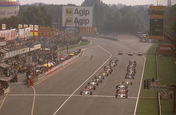 1988 Italian Grand Prix: Ayrton Senna and Alain Prost lead off from the front row at the start