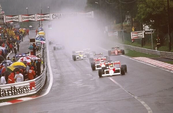 1989 Belgian Grand Prix: Ayrton Senna enters La Source at the start followed by teammate Alain Prost, Gerhard Berger, Thierry Boutsen and Nigel