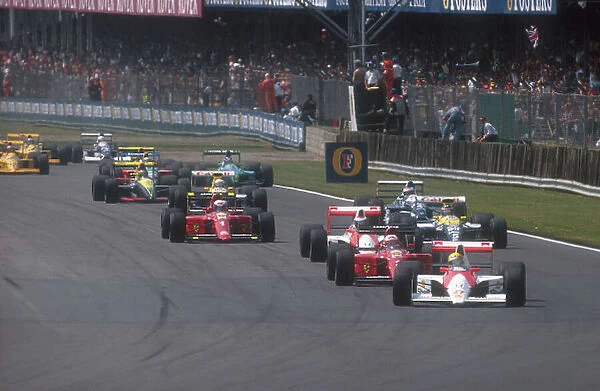 1990 British Grand Prix. Silverstone, England. 13-15 July 1990. Ayrton Senna (McLaren MP4 / 5B Honda) leads Nigel Mansell (Ferrari 641), Gerhard Berger (McLaren MP4 / 5B Honda), Alain Prost (Ferrari 641), Thierry Boutsen (Williams FW13B Renault)