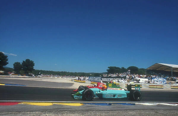 1990 French Grand Prix. Paul Ricard, Le Castellet, France. 6-8 July 1990. Mauricio Gugelmin (Leyton House CG901 Judd) moves over to let Alain Prost (Ferrari 641) past. Ref-90 FRA 10. World Copyright - LAT Photographic