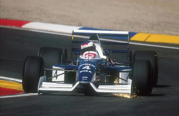 1990 French Grand Prix. Paul Ricard, Le Castellet, France. 6-8 July 1990. Jean Alesi (Tyrrell 019 Ford). He exited the race with a differential failure. Ref-90 FRA 20. World Copyright - LAT Photographic