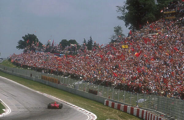 1990 San Marino Grand Prix. Imola, Italy. 11-13 May 1990. As usuall, the tifosi was out in force to support the scarlet cars of Ferrari. Ref-90 SM 11. World Copyright - LAT Photographic