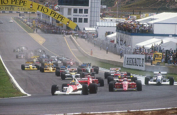 1990 Spanish Grand Prix. Jerez, Spain. 28-30 September 1990. Ayrton Senna (McLaren MP4 / 5B Honda) leads Alain Prost, Nigel Mansell (both Ferrari 641's), Gerhard Berger (McLaren MP4 / 5B Honda), Riccardo Patrese