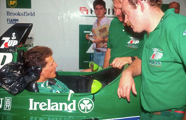 1991 Belgian Grand Prix. Spa-Francorchamps, Belgium. 23-25 October 1991. Michael Schumacher takes a seat fitting in the Jordan 191 Ford for his Grand Prix debut. Ref-91 BEL 13. World Copyright - LAT Photographic