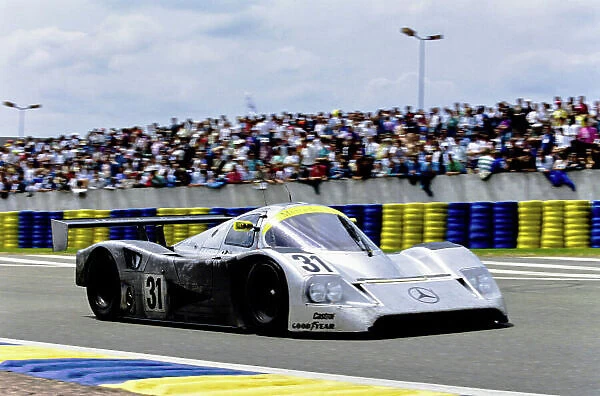 1991 Le Mans 24 hours. Le Mans, France. 22nd - 23rd June 1991. Karl Wendlinger  /  Michael Schumacher  /  Fritz Kreutzpointner (Mercedes-Benz C11), 5th position, action. World Copyright: LAT Photographic. Ref: 91LM g