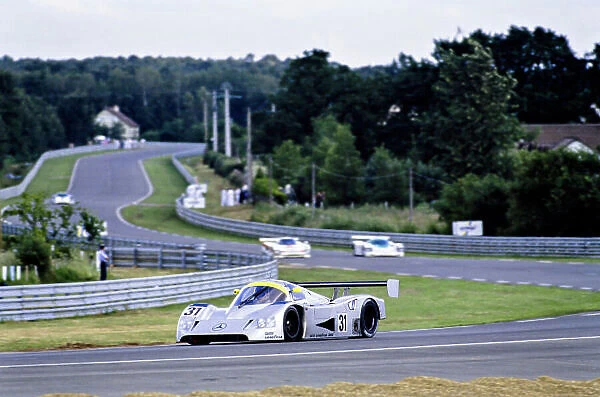 1991 Le Mans 24 hours. Le Mans, France. 22nd - 23rd June 1991. Karl Wendlinger  /  Michael Schumacher  /  Fritz Kreutzpointner (Mercedes-Benz C11), 5th position, action. World Copyright: LAT Photographic. Ref: 91LM h