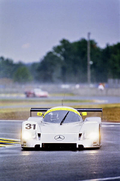 1991 Le Mans 24 hours. Le Mans, France. 22nd - 23rd June 1991. Karl Wendlinger  /  Michael Schumacher  /  Fritz Kreutzpointner (Mercedes-Benz C11), 5th position, action. World Copyright: LAT Photographic. Ref: 91LM m