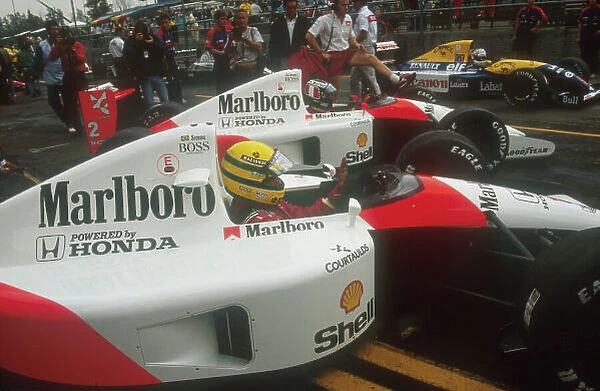 1991 San Marino Grand Prix. Imola, Italy. 26-28 April 1991. Ayrton Senna and Gerhard Berger (both McLaren MP4 / 6 Honda's) wait in the queue before the pitlane is opened