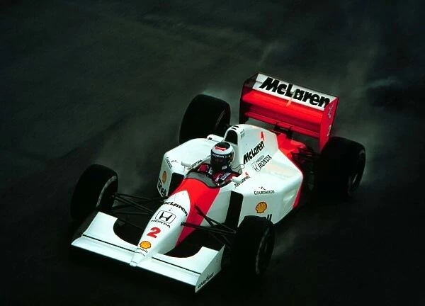 1992 BRITISH GP. Gerhard Berger finishes 5th at Silverstone behind winner Nigel