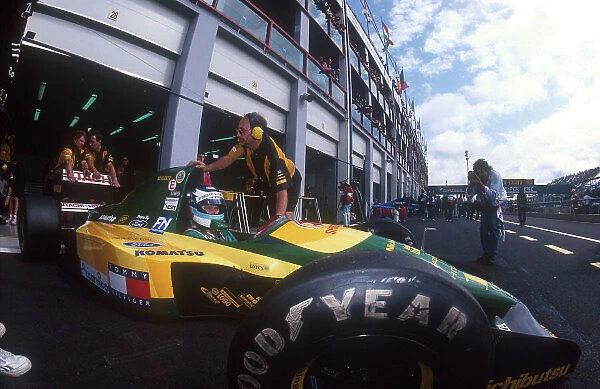 1992 French Grand Prix. Magny-Cours, France. 3-5 June 1992. Mika Hakkinen (Lotus 107 Ford) 4th position, about to be rolled back into the garage. Ref-92 FRA 04. World Copyright - LAT Photographic