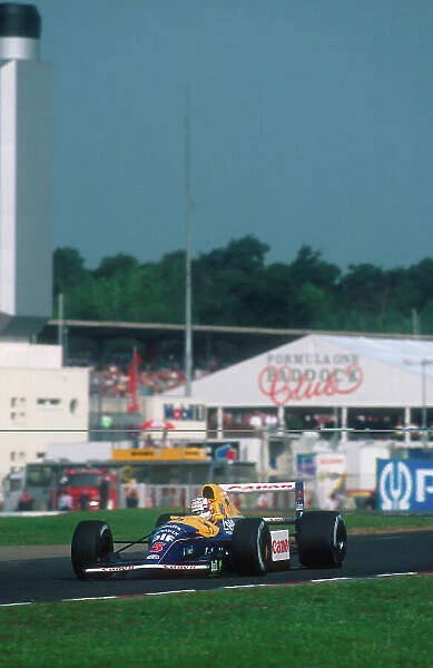 1992 German Grand Prix. Hockenheim, Germany. 24-26 July 1992. Nigell Mansell (Williams FW14B Renault) 1st position. Ref-92 GER 03. World Copyright - LAT Photographic
