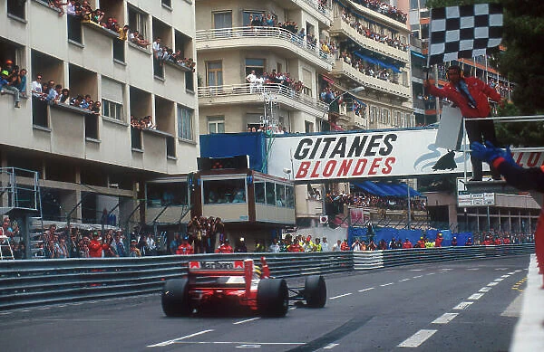1992 Monaco Grand Prix. Monte Carlo, Monaco. 28-31 May 1992. Ayrton Senna (McLaren MP4 / 7A Honda) takes the chequered flag (waived by Jacky Ickx) for 1st position. Ref-92 MON 08. World Copyright - LAT Photographic