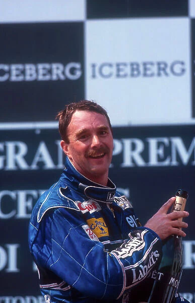 1992 San Marino Grand Prix. Imola, Italy. 15-17 May 1992. Nigel Mansell (Williams Renault) 1st position on the podium. Setting a new record of winning five consecutive Grand Prix from the start of the season. Ref-92 SM 03. World Copyright - LAT