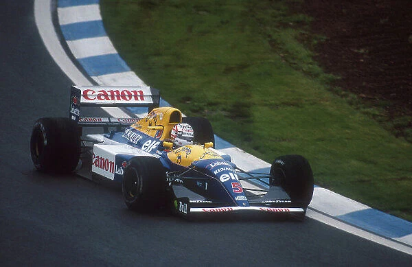 1992 Spanish Grand Prix. Barcelona, Spain. 1-3 May 1992. Nigel Mansell (Williams FW14B Renault) 1st position. Ref-92 ESP 13. World Copyright - LAT Photographic