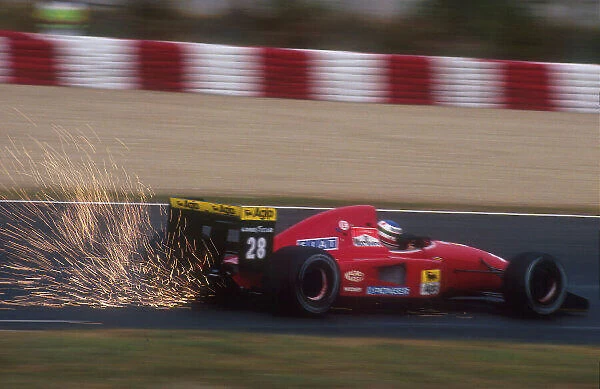1992 Spanish Grand Prix. Barcelona, Spain. 1-3 May 1992. Ivan Capelli (Ferrari F92A) 10th position kicks up the sparks. Ref-92 ESP 05. World Copyright - LAT Photographic