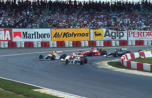 1993 Brazilian Grand Prix. Interlagos, Sao Paulo, Brazil. 26-28 March 1993. Alain Prost (Williams FW15C Renault) leads Ayrton Senna (McLaren MP4 / 8 Ford), Damon Hill (Williams FW15C Renault), J.J
