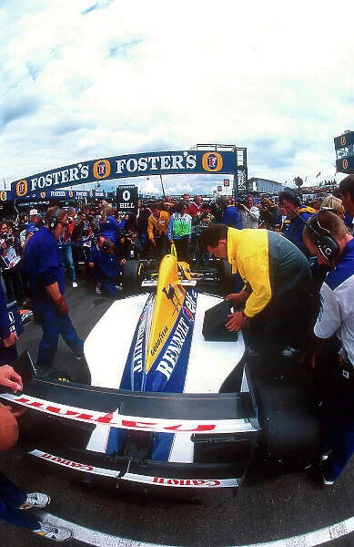 1993 British Grand Prix. Silverstone, England. 9-11 July 1993. Damon Hill (Williams FW15C Renault) on pole position before the start of the Grand Prix. Ref-93 GB 23. World Copyright - LAT Photographic