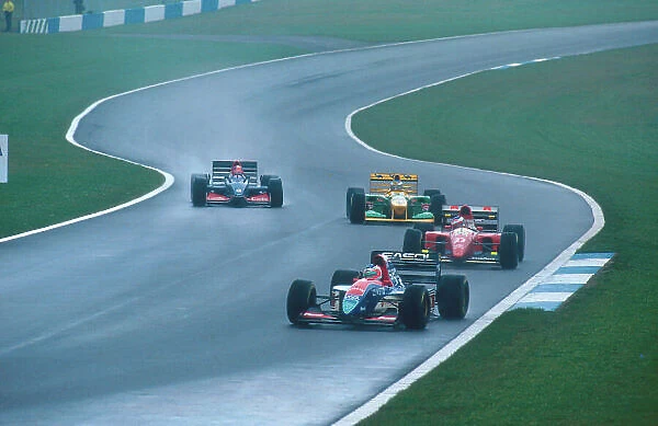 1993 European Grand Prix. Donington Park, England. 9-11 April 1993. Rubens Barrichello (Jordan 193 Hart) followed by Jean Alesi (Ferrari F93A), Michael Schumacher (Benetton B193B Ford) and Ukyo Katayama (Tyrrell 020C Yamaha)