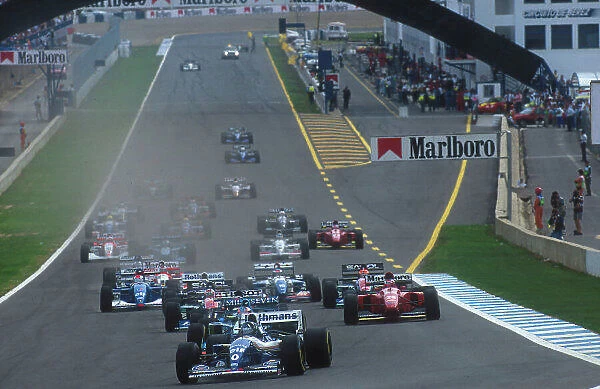 1994 European Grand Prix. Jerez, Spain. 14-16 October 1994. Damon Hill (Williams FW16B Renault) leads Michael Schumacher (Benetton B194 Ford), Heinz-Harald Frentzen (Sauber C13 Mercedes)