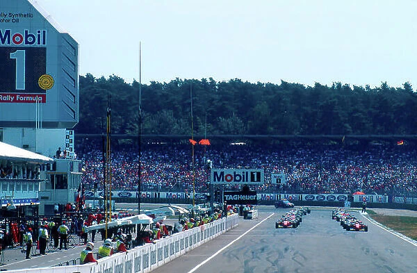 1994 German Grand Prix. Hockenheim, Germany. 29-31 July 1994. Gerhard Berger on pole with teammate Jean Alesi (both Ferrari 412T1B's) on the front row of the grid with him for the start. Ref-94 GER 18. World Copyright - LAT Photographic