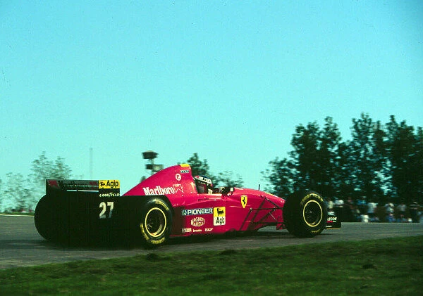 1995 ARGENTINIAN GP. Jean Alesi, Ferrari, finishes 2nd on the podium. Photo: LAT