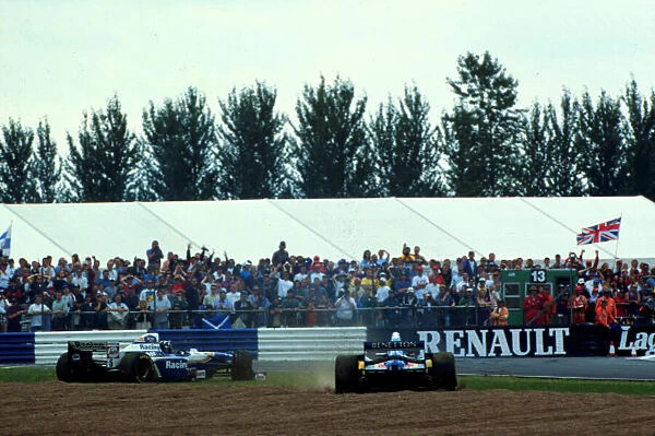 1995 BRITISH GP. MIchael Schumacher collides with Damon Hill
