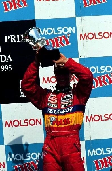 1995 CANADIAN GP. Eddie Irvine gets his first podium of his career