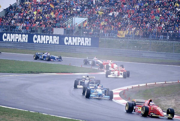 1995 European Grand Prix. Nurburgring, Germany. 29 / 9-1 / 10 1995. Jean Alesi (Ferrari 412T2) followed by Johnny Herbert (Benetton B195 Renault), Heinz-Harald Frentzen (Sauber C14 Ford), Mika Hakkinen, Mark Blundell (both McLaren MP4 / 10C Mercedes)