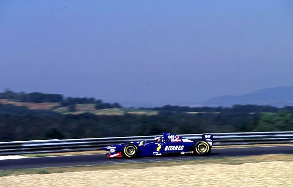 1995 HUNGARIAN GP. Olivier Panis, Ligier, finishes 6th at thew Hungaroring