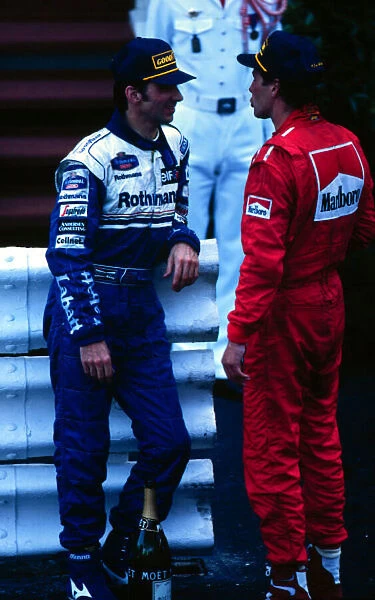 1995 MONACO GP. Damon Hill and Gerhard Berger chat before mounting the podium to